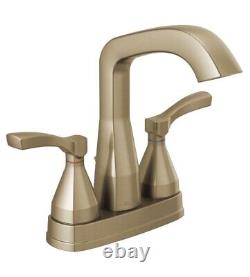 New DELTA Stryke 25776-CZMPU-DST Center Set Bathroom Faucet Champagne Bronze